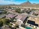 Aerial view of house, pool, and backyard; showing surrounding neighborhood and mountains at 5519 W Big Oak St, Phoenix, AZ 85083