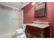 Well-appointed bathroom showcasing a vanity with granite countertop and a shower with glass doors at 6604 W Evans Dr, Glendale, AZ 85306