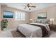 Inviting bedroom with neutral tones, decorative artwork, and soft lighting at 6604 W Evans Dr, Glendale, AZ 85306