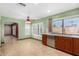 Bright kitchen with stainless steel appliances, ample counter space, and a large window at 6604 W Evans Dr, Glendale, AZ 85306