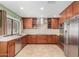 Well-lit kitchen featuring stainless steel appliances and light countertops at 6604 W Evans Dr, Glendale, AZ 85306