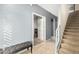 Hallway area with access to the stairs and other rooms in the home at 6605 N 93Rd Ave # 1101, Glendale, AZ 85305