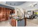 Modern kitchen showcasing an island with sink, stainless steel appliances, and pendant lighting at 6605 N 93Rd Ave # 1101, Glendale, AZ 85305