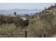 Desert home overlooking a city view with lush vegetation in the foreground at 6825 N 39Th Pl, Paradise Valley, AZ 85253