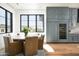 Bright dining area with a large picture window and custom built-in cabinets at 6825 N 39Th Pl, Paradise Valley, AZ 85253