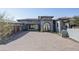 Stunning home exterior with red brick circular driveway and tile roof at 6825 N 39Th Pl, Paradise Valley, AZ 85253