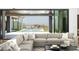 Cozy living room with view of outdoor pool, comfortable seating, and modern décor at 6825 N 39Th Pl, Paradise Valley, AZ 85253