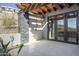 Outdoor shower with a stone wall, pergola, and tile flooring, perfect for relaxation at 6825 N 39Th Pl, Paradise Valley, AZ 85253