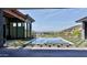 Backyard with a modern tiled pool, stepping stones and mountain views beyond the backyard fence at 6825 N 39Th Pl, Paradise Valley, AZ 85253