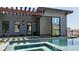 Backyard with a modern tiled pool, stepping stones and mountain views beyond the open slider at 6825 N 39Th Pl, Paradise Valley, AZ 85253
