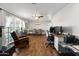 Spacious dining area with hardwood floors and large windows at 7228 N 11Th Ave, Phoenix, AZ 85021