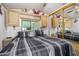Main bedroom with large bed and mirrored closet doors at 8700 E University Dr # 737, Mesa, AZ 85207