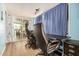 Home office with two executive chairs and a view to the back patio at 8700 E University Dr # 737, Mesa, AZ 85207