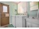Bright laundry room with washer, dryer, and storage at 8700 E University Dr # 737, Mesa, AZ 85207