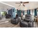 Living room with two recliner chairs and view to exterior at 8700 E University Dr # 737, Mesa, AZ 85207