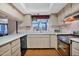 Galley kitchen with ample cabinetry and modern appliances at 888 W Vah Ki Inn Rd, Coolidge, AZ 85128