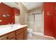 Bathroom with a shower/tub combo and wood vanity at 8957 E Rainier Dr, Gold Canyon, AZ 85118