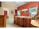Spacious bedroom with southwestern decor and an en-suite bathroom at 8957 E Rainier Dr, Gold Canyon, AZ 85118