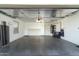 Spacious two-car garage with built-in storage cabinets at 8957 E Rainier Dr, Gold Canyon, AZ 85118