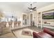Open floor plan connecting living room and kitchen with hardwood floors at 8957 E Rainier Dr, Gold Canyon, AZ 85118