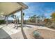 Spacious patio with seating area and a view of the desert landscape at 8957 E Rainier Dr, Gold Canyon, AZ 85118