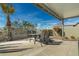 Covered patio with seating area, perfect for outdoor dining at 8957 E Rainier Dr, Gold Canyon, AZ 85118