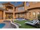 Stunning backyard with a pool, spa, beautiful landscaping, and lounge chairs at 9815 N Copper Ridge Trl, Fountain Hills, AZ 85268