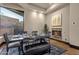 Inviting dining room featuring a fireplace, elegant table setting, and comfortable seating at 9815 N Copper Ridge Trl, Fountain Hills, AZ 85268