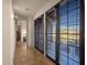 Hallway with access to the balcony and a storage area at 9815 N Copper Ridge Trl, Fountain Hills, AZ 85268