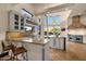 Gourmet kitchen with island seating, professional appliances, and stunning windows for natural light at 9815 N Copper Ridge Trl, Fountain Hills, AZ 85268