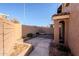 Landscaped backyard with brick planters at 10445 N 11Th Pl # 1, Phoenix, AZ 85020