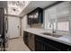 Updated kitchen featuring stainless steel appliances and dark cabinetry at 10445 N 11Th Pl # 1, Phoenix, AZ 85020