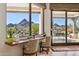 Bright breakfast nook with stunning views from large windows at 10585 E Crescent Moon Dr # 33, Scottsdale, AZ 85262