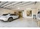 Spacious garage with epoxy floor, ample storage, and EV charger at 10585 E Crescent Moon Dr # 33, Scottsdale, AZ 85262