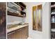 Well-organized kitchen pantry with ample shelving for storage at 10585 E Crescent Moon Dr # 33, Scottsdale, AZ 85262