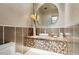 Chic powder room, featuring a contemporary sink and large mirror at 10585 E Crescent Moon Dr # 33, Scottsdale, AZ 85262