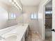 Bathroom with double sinks and tile flooring at 10765 N 119Th St, Scottsdale, AZ 85259