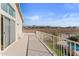 Deck overlooking the backyard, pool, and mountain views at 10765 N 119Th St, Scottsdale, AZ 85259