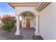 Covered entryway with brick flooring and columns at 10765 N 119Th St, Scottsdale, AZ 85259