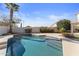 Sparkling pool with surrounding patio and landscaping at 10765 N 119Th St, Scottsdale, AZ 85259