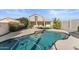 Inviting kidney-shaped pool with concrete decking at 10765 N 119Th St, Scottsdale, AZ 85259