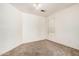 Bright bedroom with neutral carpeting and window blinds at 1085 W Dava Dr, Tempe, AZ 85283