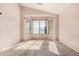 Bedroom with bay window, carpet, and ceiling fan at 1085 W Dava Dr, Tempe, AZ 85283