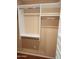 Custom closet organizers with hanging rods and shelves at 11029 W Meade Dr, Sun City, AZ 85351