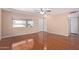 Living room features wood-look floors and ceiling fan at 11029 W Meade Dr, Sun City, AZ 85351