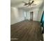 Spacious bedroom with wood-look floors and ample closet space at 11411 N 91St Ave # 170, Peoria, AZ 85345