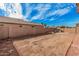 Large backyard with a paved patio and built-in grill at 11465 W Virginia Ave, Avondale, AZ 85392