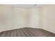 Spacious carpeted bedroom with neutral walls at 11465 W Virginia Ave, Avondale, AZ 85392