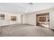 Bright living room with carpet and sliding glass doors at 11465 W Virginia Ave, Avondale, AZ 85392