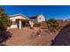 Spacious backyard with patio and desert landscaping at 1151 E Stardust Way, San Tan Valley, AZ 85143